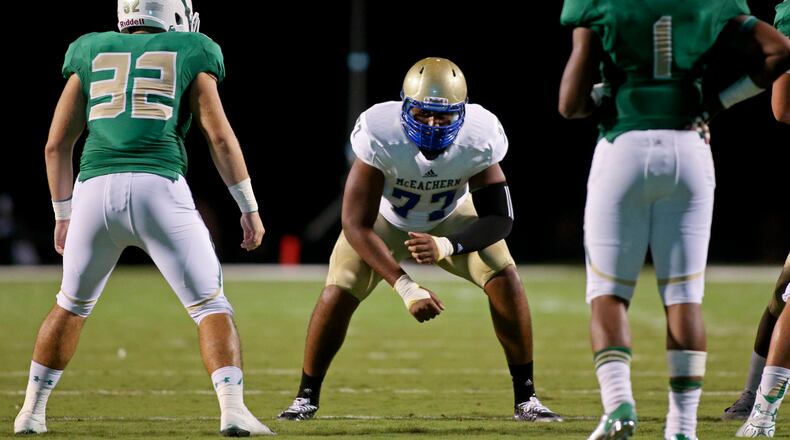 McEachern offensive lineman Chuma Edoga (77) is shown before a play against Buford Friday in Buford, Ga., Sept. 5, 2014. Buford would win 27-20. JASON GETZ / SPECIAL