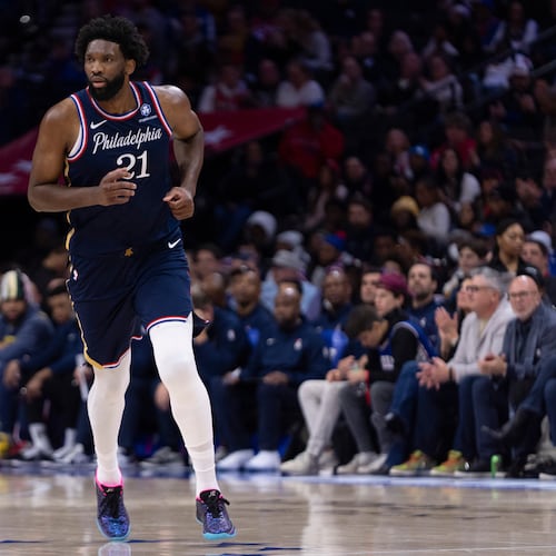 Philadelphia 76ers' Joel Embiid runs up the court during the first half of an NBA basketball game against the Atlanta Hawks, Sunday, Nov. 30, 2025, in Philadelphia. (AP Photo/Chris Szagola)