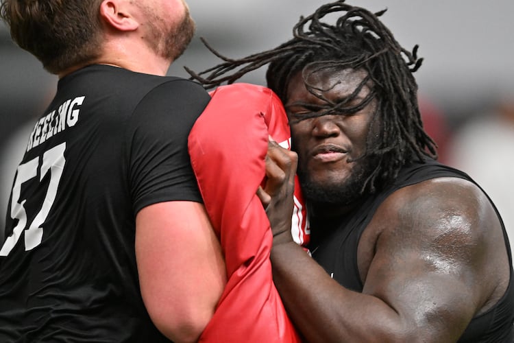 Georgia offensive lineman Monroe Freeling (left) and Georgia offensive lineman Micah Morris (right) run a drill during Georgia's NFL Pro Day at Payne Indoor Athletic Facility, Wednesday, March 18, 2026, in Athens. (Hyosub Shin/AJC)