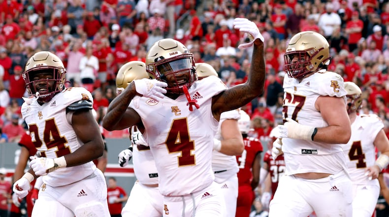 Boston College's Zay Flowers (4) celebrates following his 17-yard touchdown reception during the first half against North Carolina State at Carter-Finley Stadium on Saturday, Nov. 12, 2022, in Raleigh, North Carolina. (Lance King/Getty Images/TNS)