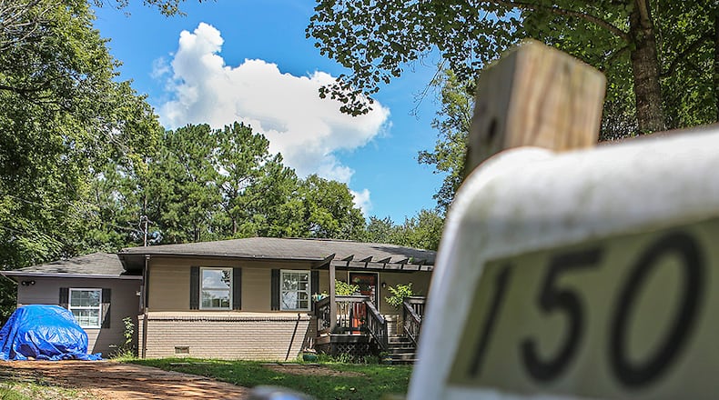 This photo taken Sept 1, 2015, shows the Boulderwoods Drive house where DeKalb police responding to a burglary call entered the wrong home, shot and killed a dog, wounded the homeowner and seriously injured a fellow officer, the GBI said. A preliminary investigation into the Aug. 31, 2015 shooting inside the Boulderwoods Drive home also determined there was "no indication of criminal activity" at that house, GBI spokesman Scott Dutton said. "Responding officers likely entered a residence unrelated to the initial 911 call although it matched the given dispatched description," he said.