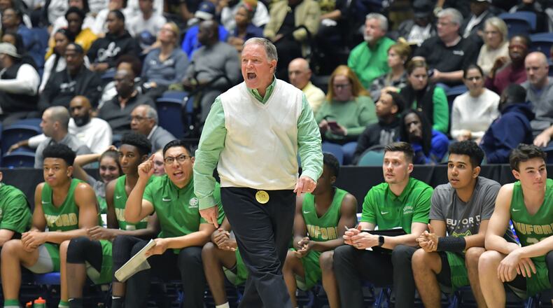 March 8, 2019 Macon - Buford head coach Eddie Martin shouts instructions at the end of the fourth quarter in GHSA State Basketball Championship game at the Macon Centreplex in Macon on Friday, March 8, 2019. Buford won 76-69 over the Fayette County. HYOSUB SHIN / HSHIN@AJC.COM