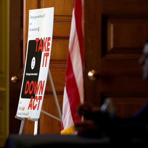 FILE - A poster outside a roundtable about an online safety bill, hosted by first lady Melania Trump, is displayed in the Capitol, March 3, 2025, in Washington. (AP Photo/Julia Demaree Nikhinson, File)