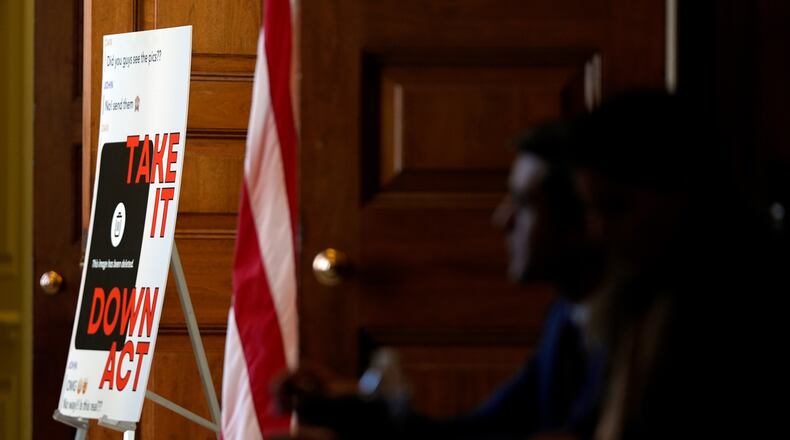 FILE - A poster outside a roundtable about an online safety bill, hosted by first lady Melania Trump, is displayed in the Capitol, March 3, 2025, in Washington. (AP Photo/Julia Demaree Nikhinson, File)