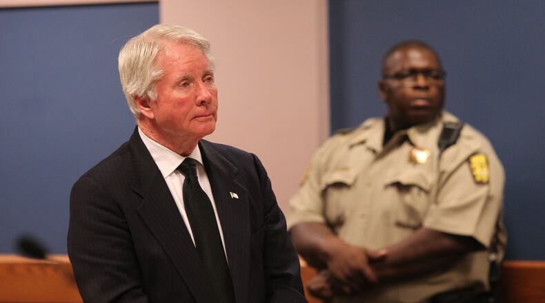 April 21, 2017, Atlanta, Georgia - Tex McIver listens during the hearing to revoke his bond conditions. Authorities conducting a search found a gun stored in a drawer full of socks at his home. One of the conditions of McIver’s bond was that he was not to have any guns. (HENRY TAYLOR / HENRY.TAYLOR@AJC.COM)
