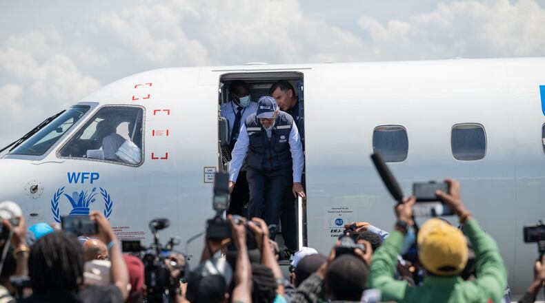 Director General of the World Health Organisation (WHO) Tedros Adhanom Ghebreyesus arrives at Bunia airport in Bunia, Congo, Saturday, May 30, 2026. (AP Photo/Moses Sawasawa)