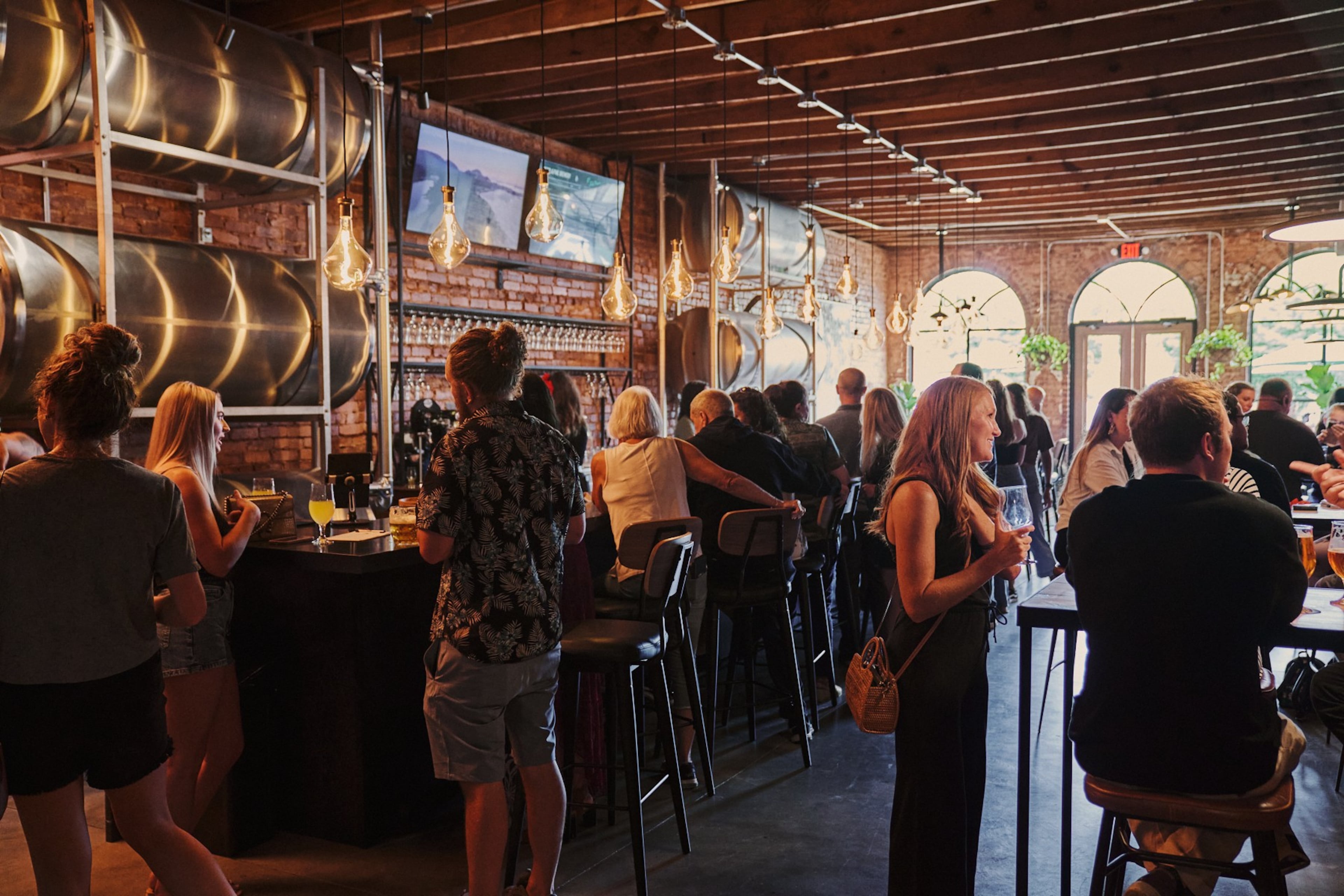 Patrons gather in the taproom at Pearl & Pine Brewery in Senoia. (Courtesy of Pearl & Pine Brewery)