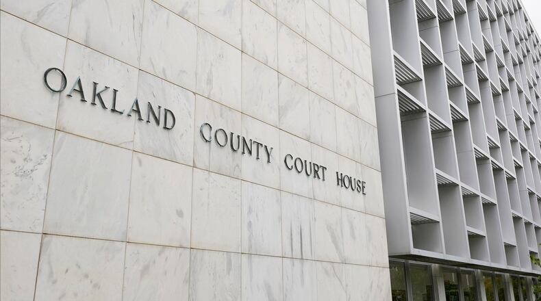 FILE - An Oakland County Courthouse building is shown in Pontiac, Mich., Oct. 19, 2020. (AP Photo/Paul Sancya, File)
