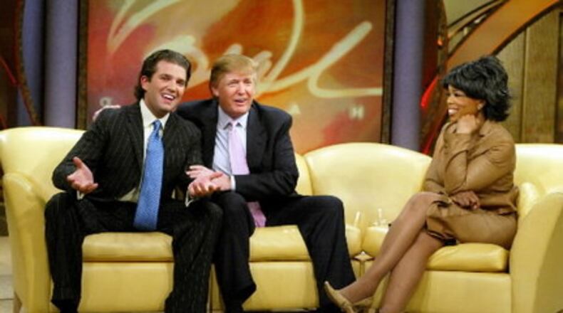 Oprah Winfrey with Donald Trump and Donald Trump Jr. on her former talk show. Associated Press photo