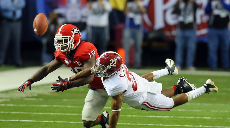 Rape charges against former Georgia football player Bacarri Rambo (left) were dismissed Tuesday. (Curtis Compton/ccompton@ajc.com)