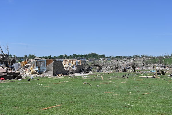 Houses lay destroyed following severe weather in London, Ky., Saturday, May 17, 2025. (AP Photo/Timothy D. Easley)
