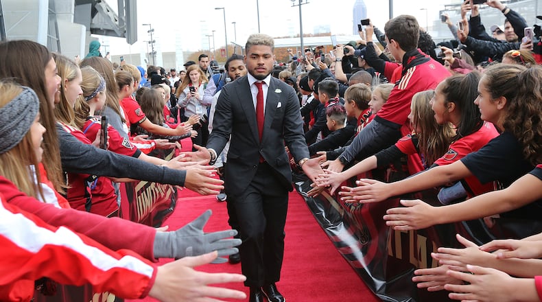 Atlanta United forward Josef Martinez is greeted by fans on the red carpet arriving to play the New York Red Bulls in their Eastern Conference finals MLS soccer game on Sunday, Nov. 25, 2018, in Atlanta.   Curtis Compton/ccompton@ajc.com