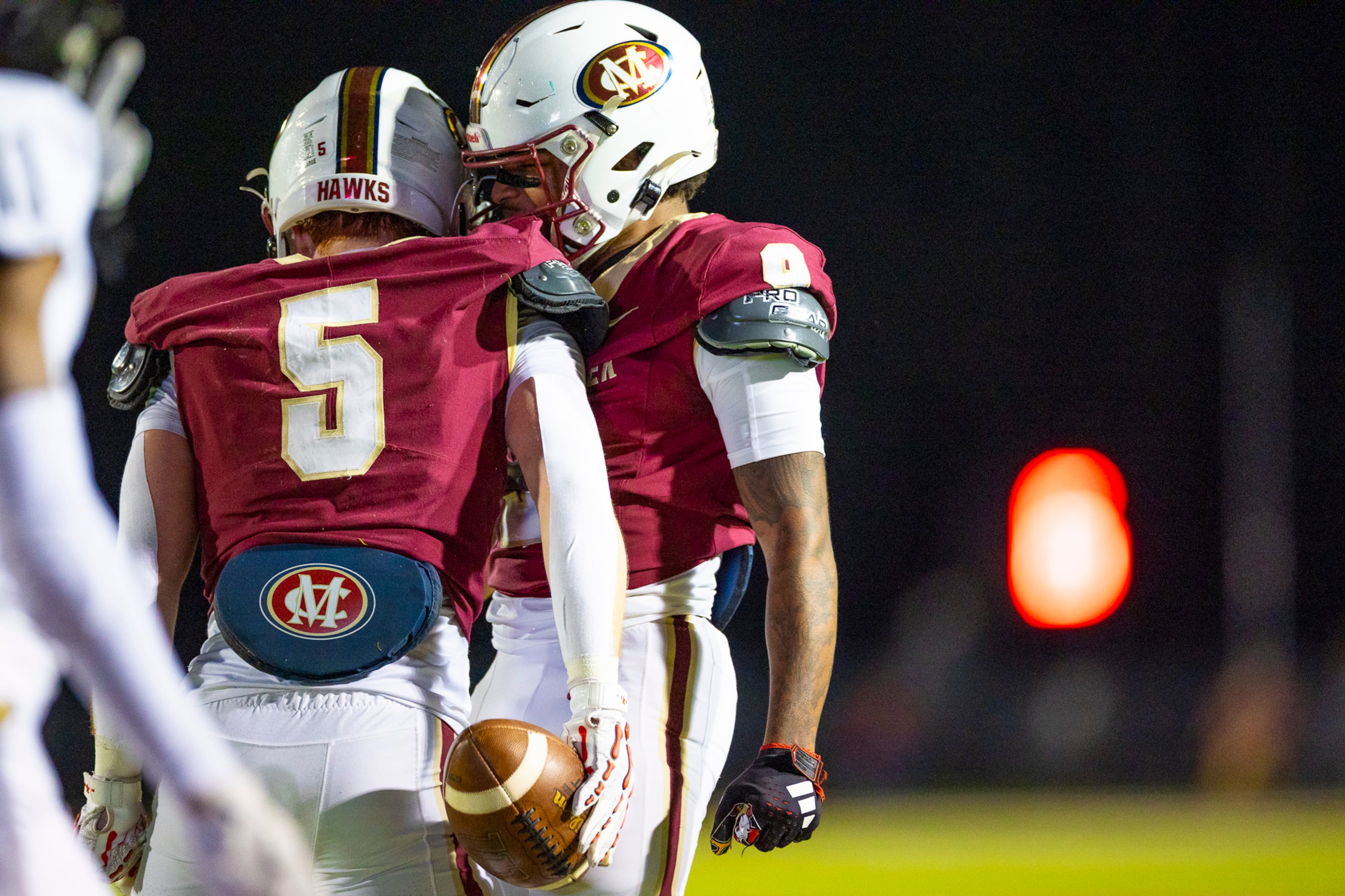 Mill Creek wide receiver Carson Hurter (5) celebrates with his teammate during the second half against Colquitt at Mill Creek Community Stadium in Hoschton on Nov. 14th, 2025. (Oscar Guevara Saenz for the AJC)