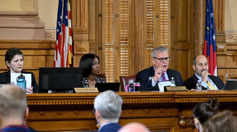 Executive Director Mike Coan (third from left) speaks at an Oct. 8 meeting of the State Election Board at the Capitol in Atlanta. (Hyosub Shin/The Atlanta Journal-Constitution)
