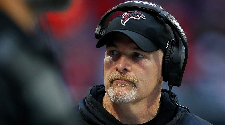 Coach Dan Quinn of the Falcons looks on against the Ravens at Mercedes-Benz Stadium on December 2, 2018. (Photo by Kevin C. Cox/Getty Images)