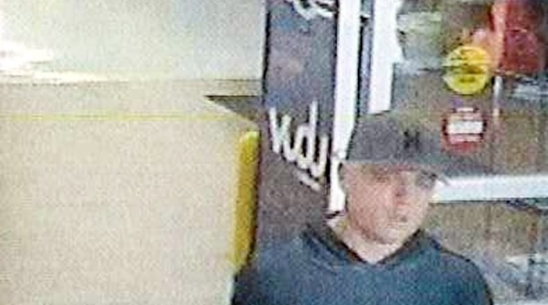 Police suspect this man of stealing credit cards from cars in a Canton subdivision.