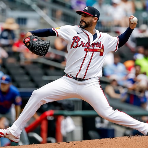 Atlanta Braves pitcher Martín Pérez delivers to a New York Mets batter during the first inning of a baseball game, Sunday, July 5, 2026, in Atlanta. (AP Photo/Erik S. Lesser)