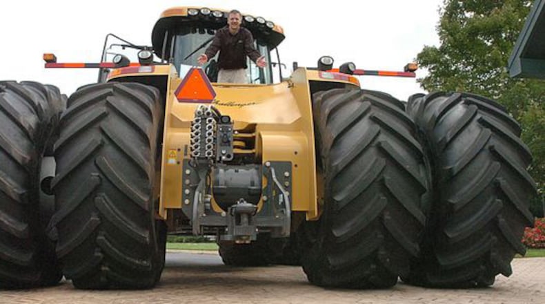 AGCO, the Duluth-based agriculture equipment maker, cited the dollar's rise as a cause of falling revenue and profit in the first quarter.
