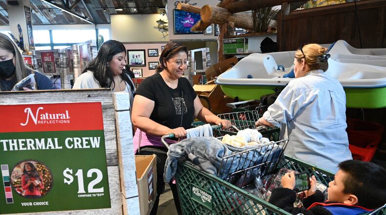 As lawmakers debate eliminating Georgia's income tax, supporters say it will post economic developement and opponents say it will raise sales taxes and other fees. (Hyosub Shin / AJC file.)