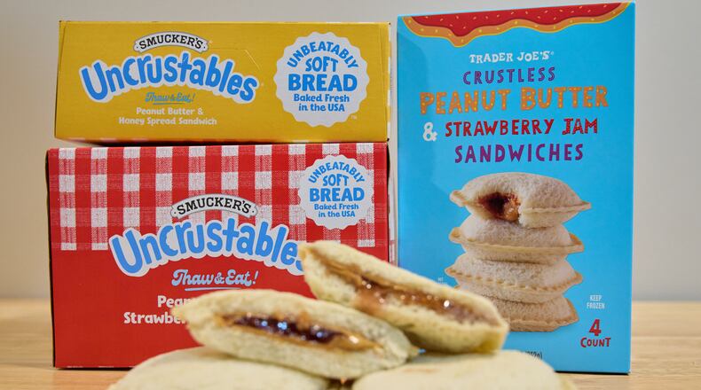 FILE - Crust-less sandwiches from Smucker's and Trader Joe's are displayed on Oct. 15, 2025, in Detroit. (AP Photo/Ryan Sun, File)