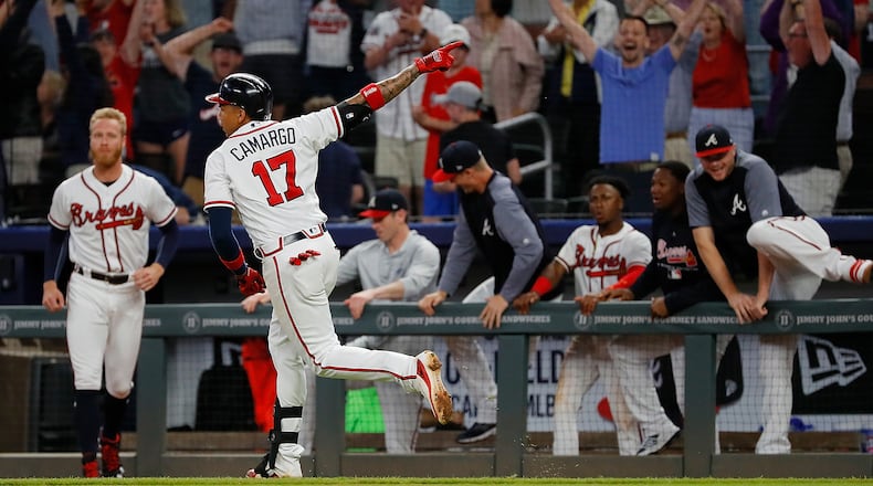 Braves infielder Johan Camargo reacts after hitting a walk-off homer in the ninth inning of a 7-6 win over the New York Mets May 29, 2018 , at SunTrust Park in Atlanta.
