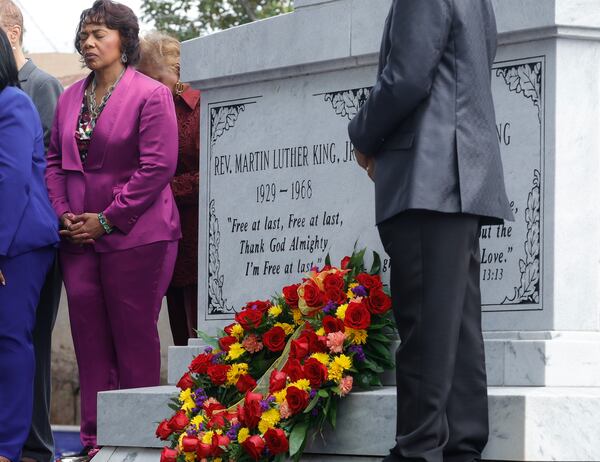 Dr. Bernice King, daughter of the Rev. Martin Luther King Jr. bows her head in prayer during a wreath-laying ceremony on the 55th anniversary of his assassination at the King Center on Monday, April 4, 2023. (Natrice Miller/natrice.miller@ajc.com)