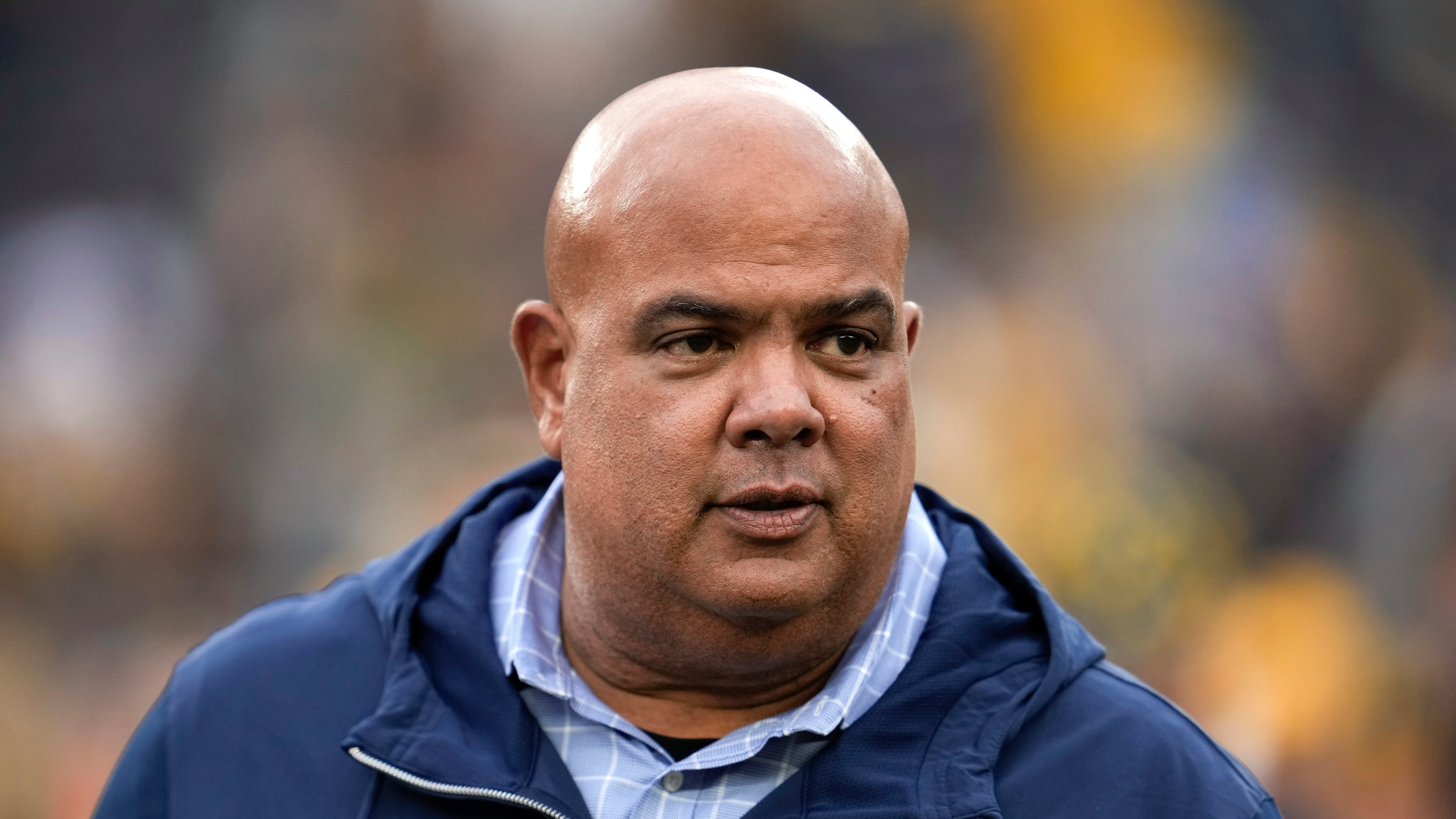 FILE - Michigan athletic director Warde Manuel watches in the second half of an NCAA college football game against UNLV in Ann Arbor, Mich., Sept. 9, 2023. (AP Photo/Paul Sancya, File)