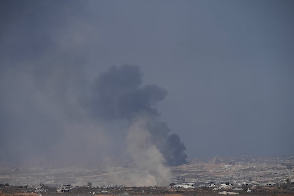 Smoke from an Israeli bombardment rises over the Gaza Strip, seen from southern Israel, Sunday, July 6, 2025. (AP Photo/Ohad Zwigenberg)