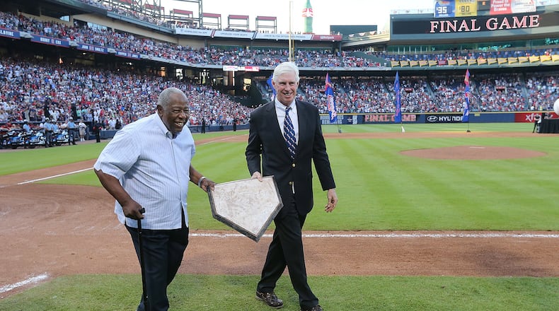 Hank Aaron and Braves Chairman & CEO Terry McGuirk removed home plate at the conclusion of the final game at Turner Field, then transfered it to the new SunTrust Park in Cobb County. (Curtis Compton /ccompton@ajc.com)