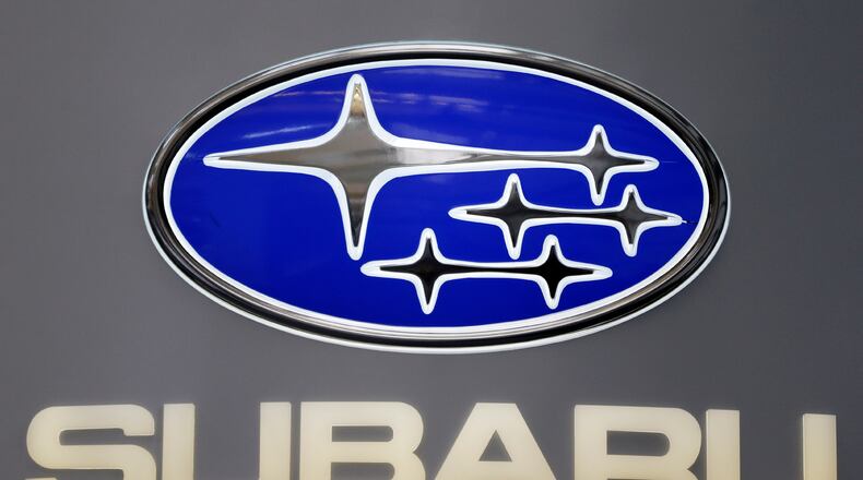FILE - This Photo taken Feb. 14, 2013 shows a Subaru logo at the 2013 Pittsburgh Auto Show in Pittsburgh. (AP Photo/Gene J. Puskar, File)