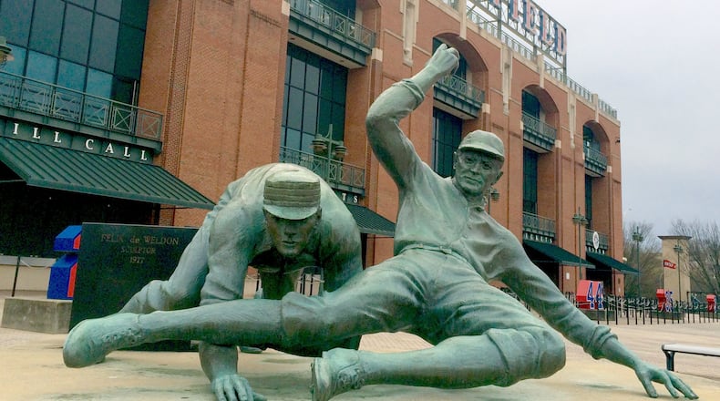 Ty Cobb slides into history outside Turner Field downtown. He apparently won’t be heading up to Smyrna with the Braves. PETE CORSON / pcorson@ajc.com