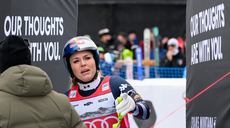 United States' Lindsey Vonn at the finish area after crashing, during an alpine ski, women’s World Cup downhill, in Crans Montana, Switzerland, Friday, Jan. 30, 2026. (Alessandro Della Valle/Keystone via AP)