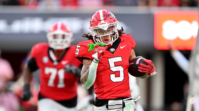 Georgia wide receiver Anthony Evans runs the ball against Mississippi State last year. On Saturday, he'll be wearing a Mississippi State uniform. (Hyosub Shin/AJC)