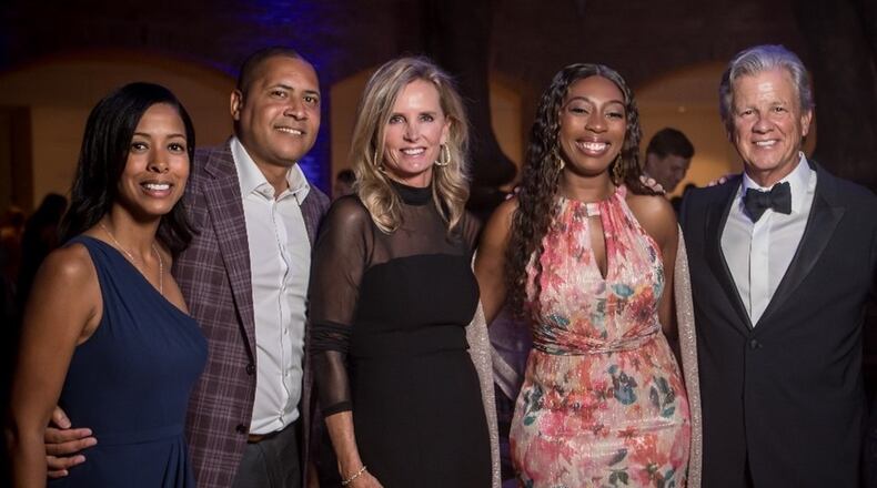 Frances Jackson (from left), John Jackson, Karyn Donahue, Channel Frazier and Paul Donahue pose during "A Timeless Affair" event at the Fernbank Museum in 2023. (Courtesy of Fernbank Museum)