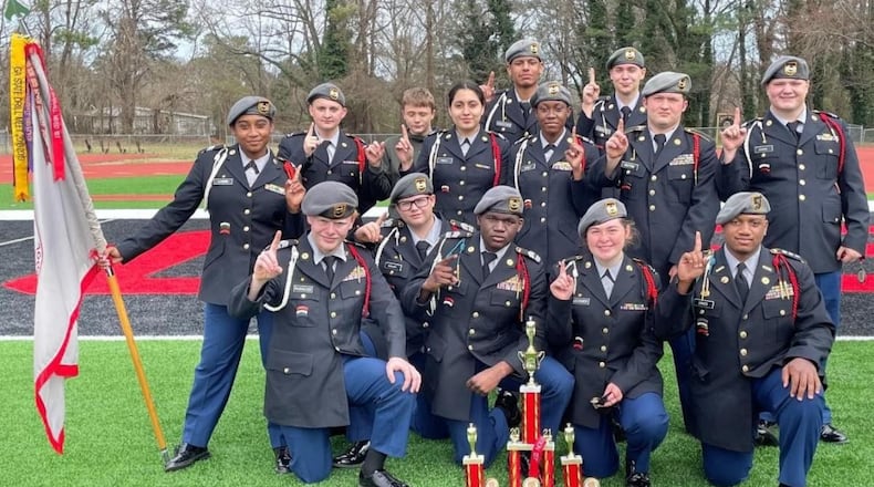 The Alexander Cougar Battalion Exhibition Team won 1st place in Squad Exhibition in the 2021 Regional Drill meet held March 6 at Osborne High School. Pictured: (Back row) David Griffith, Amari Lightford and John Eliott; (Middle row) Helen Laguna (holding guidon), Wesley Young, Danna Cabello, Brianna Gayle, Justin Dutton and Brian Blanton; (Front row) Kason Rainwater, Aiden McCleary, Alvarez Cowins, Haley Alexander and Aleczander Sykes