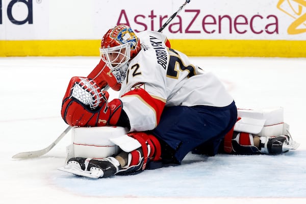 Florida Panthers goaltender Sergei Bobrovsky (72) blocks a shot by the Carolina Hurricanes during the second period of Game 1 of the NHL hockey Stanley Cup Eastern Conference finals in Raleigh, N.C., Tuesday, May 20, 2025. (AP Photo/Karl DeBlaker)