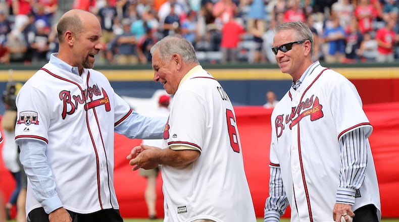 October 02, 2016 Atlanta: John Smoltz (from left) gives Bobby Cox a hug with Tom Glavine looking on during the pregame ceremony for the Braves final game at Turner Field on Sunday, Oct. 2, 2016, in Atlanta. Curtis Compton /ccompton@ajc.com