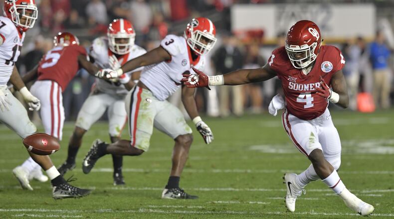 Running back Trey Sermon (4) committed to Oklahoma, even as he was recruited by Georgia.