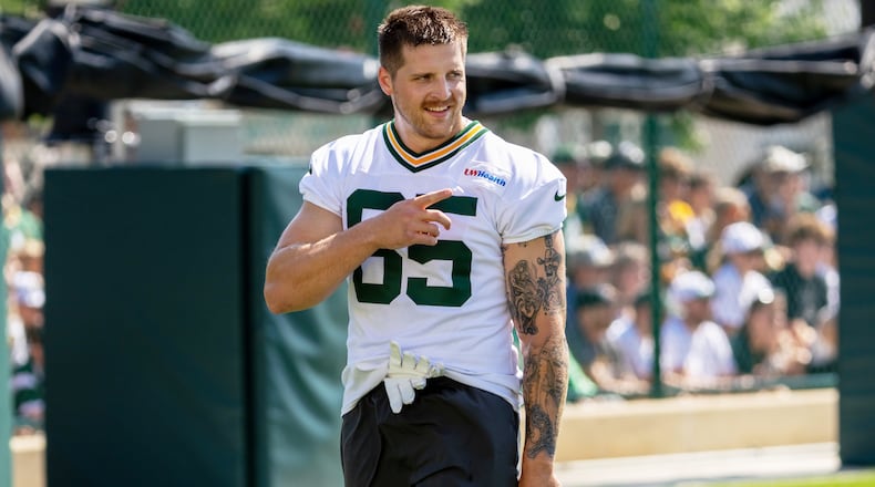 FILE - Green Bay Packers tight end Tucker Kraft points during the NFL football team's training camp, Aug. 2, 2026, in Green Bay, Wis. (AP Photo/Mike Roemer, File)
