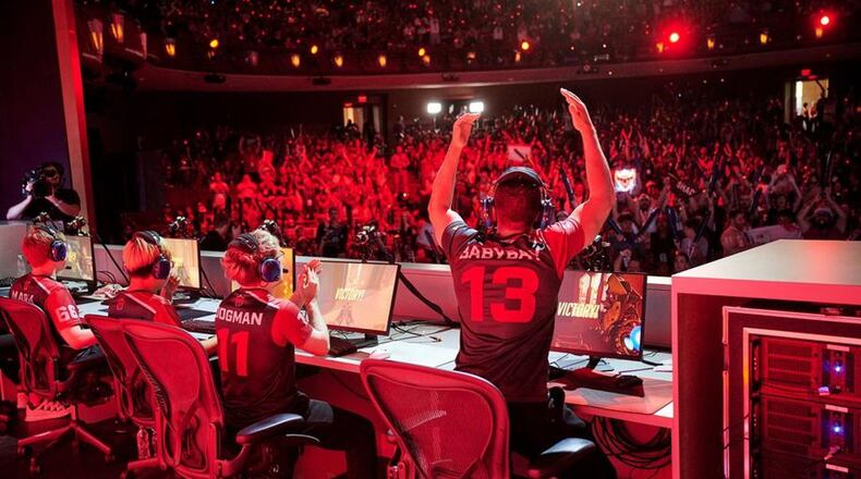 People play Overwatch in a tournament. AJC FILE PHOTO: Tonya McCahon for Blizzard Entertainment
