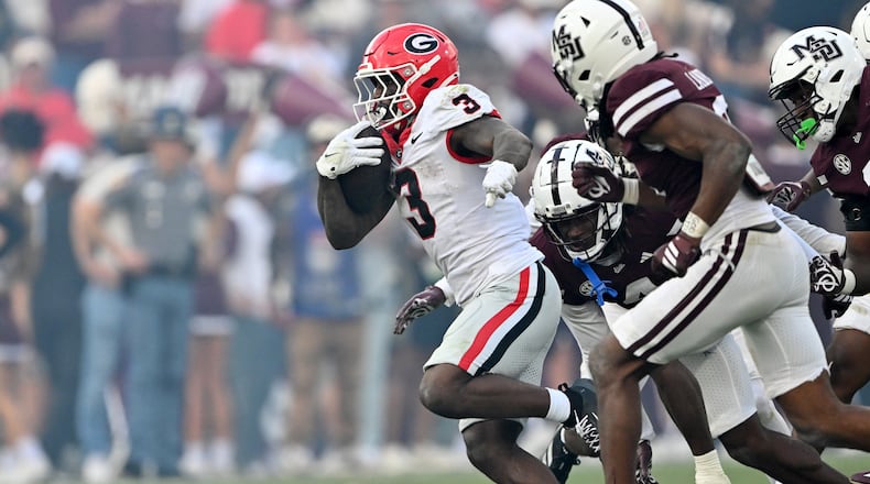 Georgia running back Nate Frazier (3) runs for a first down during the second half in an NCAA football game at Davis Wade Stadium, Saturday, November 8, 2025, in Starkville, Mississippi. Georgia won 41-21 over Mississippi State. (Hyosub Shin/AJC)