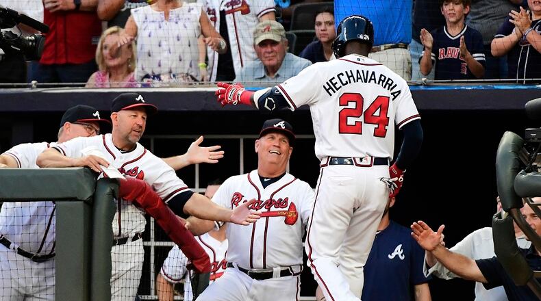 Adeiny Hechavarria #24 of the Atlanta Braves celebrates hitting a 2-run home run in the second inning against the Miami Marlins at SunTrust Park on August 21, 2019 in Atlanta, Georgia. (Photo by Logan Riely/Getty Images)