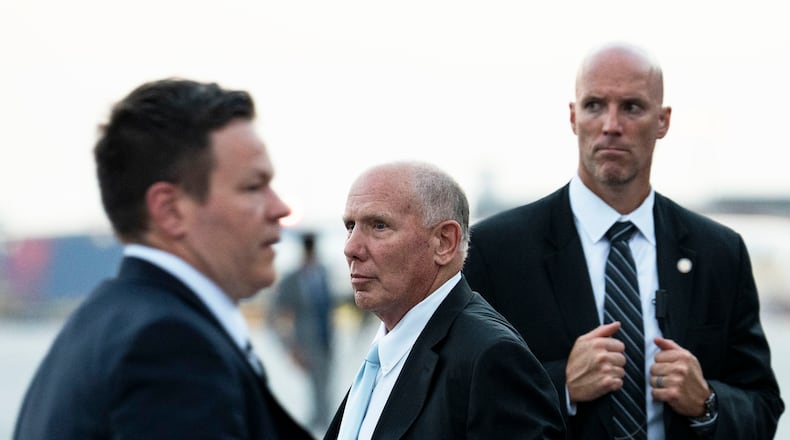 Steven H. Sadow, center, arrives at the airport in Atlanta on Aug. 24, 2023, after Donald J. Trump’s booking at the Fulton County Jail. Steven Sadow has represented Atlanta’s top rap stars, one of its most famous strip club owners and a friend of NFL legend Ray Lewis charged with the linebacker in a double homicide outside a Buckhead nightclub. (Doug Mills/The New York Times)