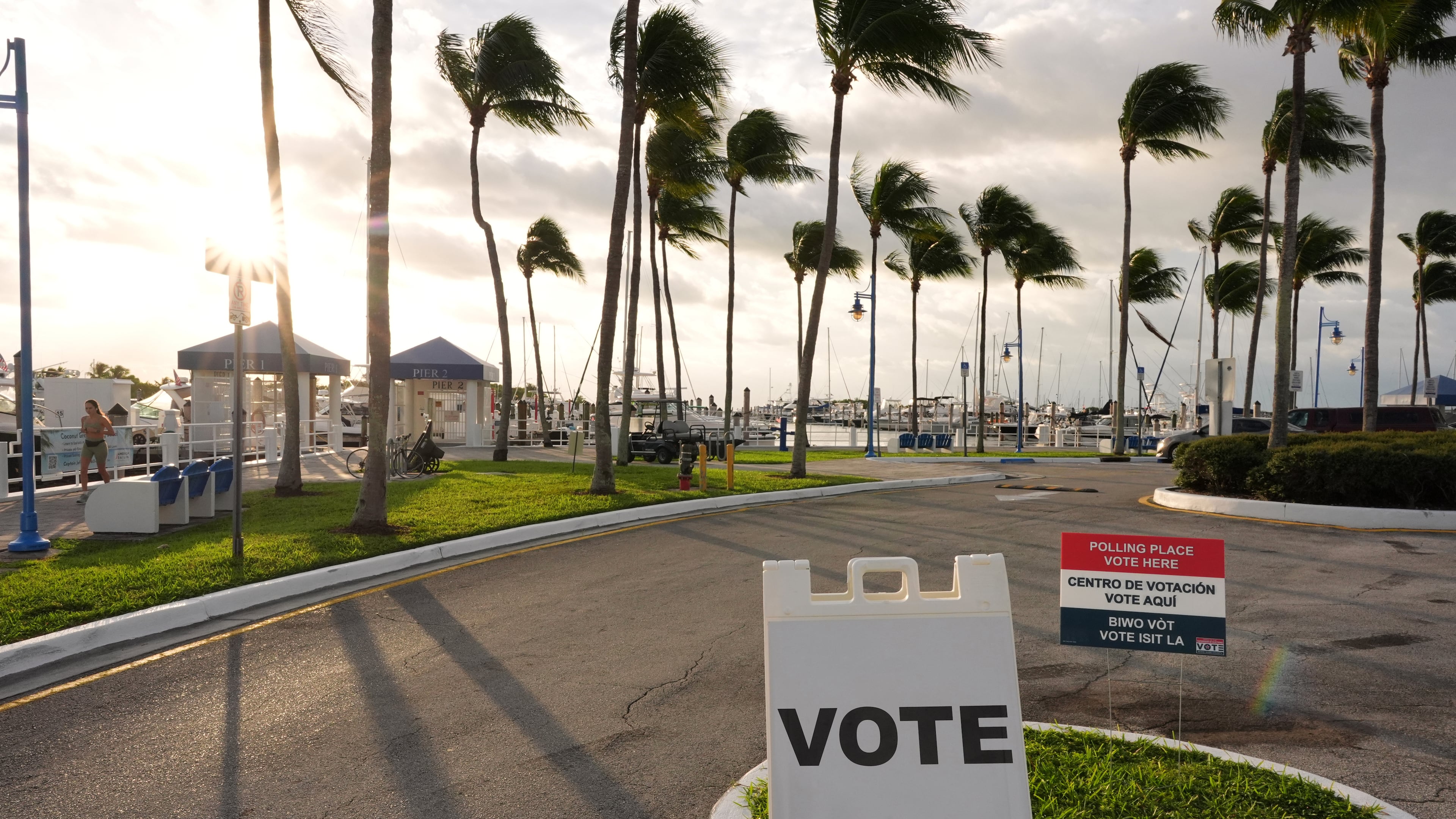 Signs indicate a polling place at Miami City Hall, on Election Day, Tuesday, Nov. 4, 2025, in Miami. (AP Photo/Rebecca Blackwell)