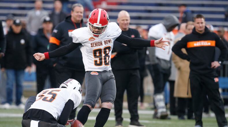 Georgia's Rodrigo Blankenship kicks a field goal as the South squad runs drills during practice for the Senior Bowl Wednesday, Jan. 22, 2020, in Mobile, Ala. (AP Photo/Butch Dill)