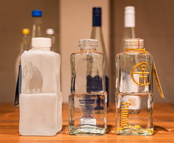 Fromin water from Czechia submitted three bottles, including one (right) that contained gold flakes. (Henri Hollis/AJC)