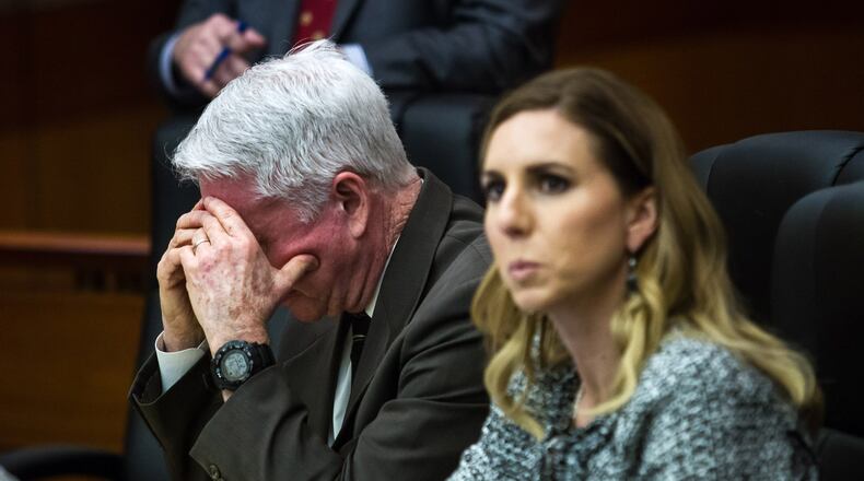 Tex McIver (L) listens to Dr. Susanne Hardy of Emory Hospital testify on Day 4 of his murder trial in Fulton County courtroom on Friday, March 16, 2018. STEVE SCHAEFER / SPECIAL TO THE AJC