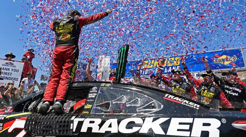 NASCAR driver Martin Truex Jr. (78) faces his teammates as he celebrates in the winner's circle after winning the Toyota/Save Mart 350 at Sonoma Raceway in Sonoma, Calif., on Sunday, June 24, 2018. One of Truex Jr.'s sponsors, 5-hour ENERGY, will not be returning after the 2018 season and is leaving NASCAR altogether. (Jose Carlos Fajardo/Bay Area News Group/TNS)