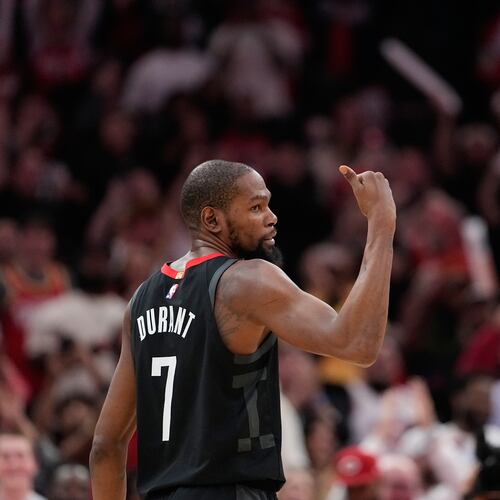 Houston Rockets' Kevin Durant (7) celebrates after making a game-winning 3-point basket against the Phoenix Suns during the second half of an NBA basketball game Monday, Jan. 5, 2026, in Houston. (AP Photo/David J. Phillip)