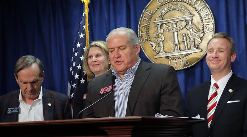 Senator John Albers (from right), R - Roswell, Rep. Chuck Martin, R - Alpharetta, House Speaker Pro-Tempore Jan Jones, R - Milton, and Senator Fran Millar, R - Atlanta, at a press conference Tuesday on the final passage of legislation addressing Fulton County tax exemptions. A number of homestead exemptions that passed for North Fulton and the schools will let people improve their homes without losing the lower assessed value. BOB ANDRES /BANDRES@AJC.COM